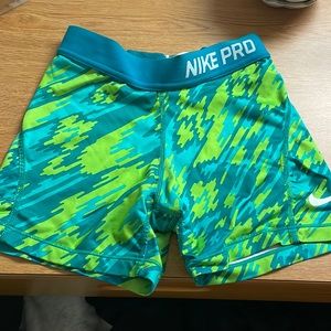 kids size medium nike pros